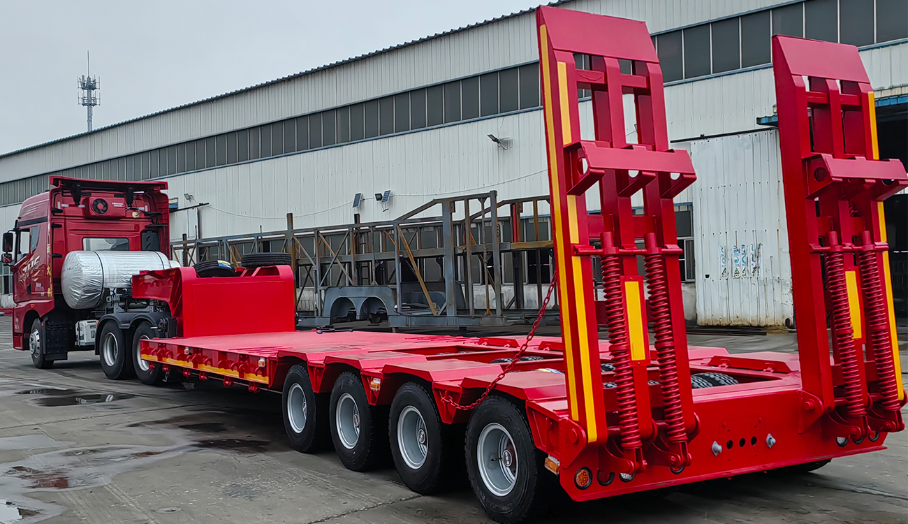 Angola Customers Choose 4 Axle Lowbed Semi Trailer for Efficient Transportation of Heavy Machinery